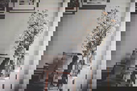 chair and flowers in corner