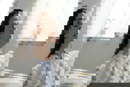 woman with eyes closed