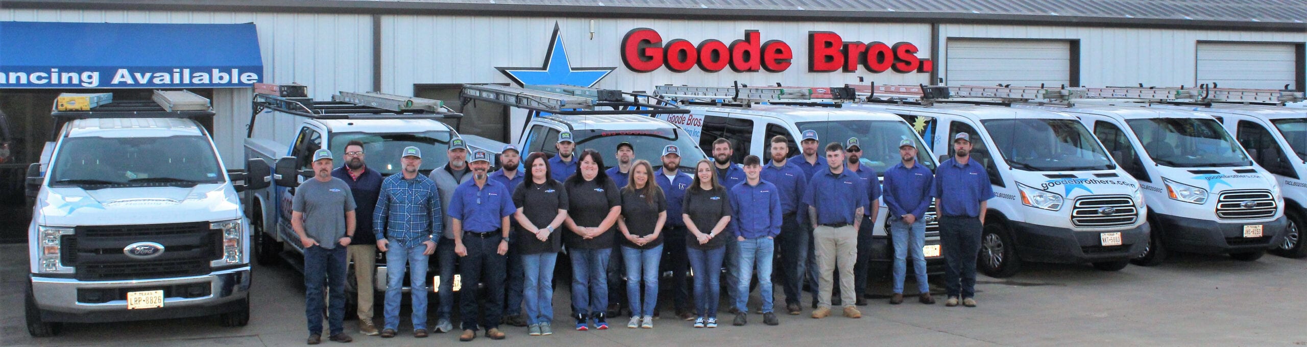 Goode Bros Team standing in front of office.